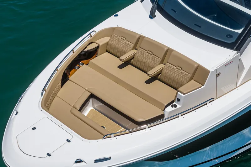 Slide: The Image of 2023 Sea Ray Sundancer 370 OB boat with luxurious tan seating on deck. - 14