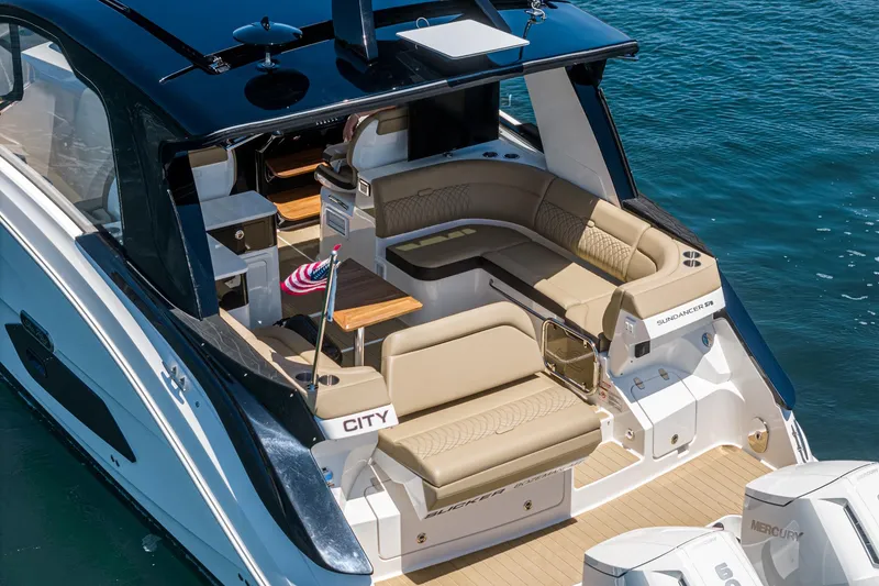 Slide: The Image of 2023 Sea Ray Sundancer 370 OB luxury yacht with spacious seating and elegant design. - 5