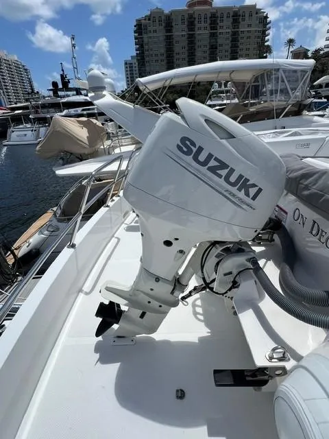 Slide: The Image of Zar Formenti ZF-1 boat with Suzuki outboard motor, docked in a marina, 2020 model. - 5