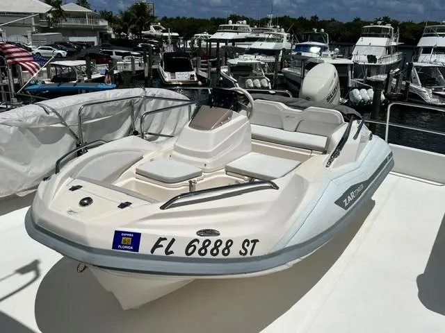 Slide: The Image of 2020 Zar Formenti ZF-1 boat docked at marina, Florida registration visible. - 7