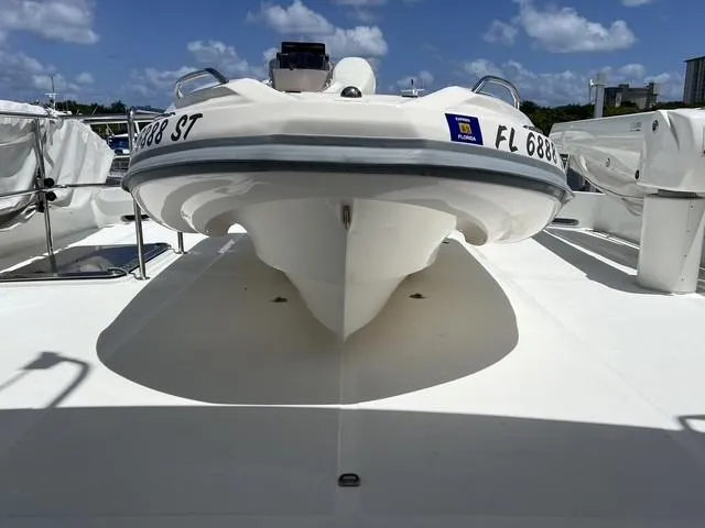 Slide: The Image of 2020 Zar Formenti ZF-1 boat docked under a clear blue sky. - 8