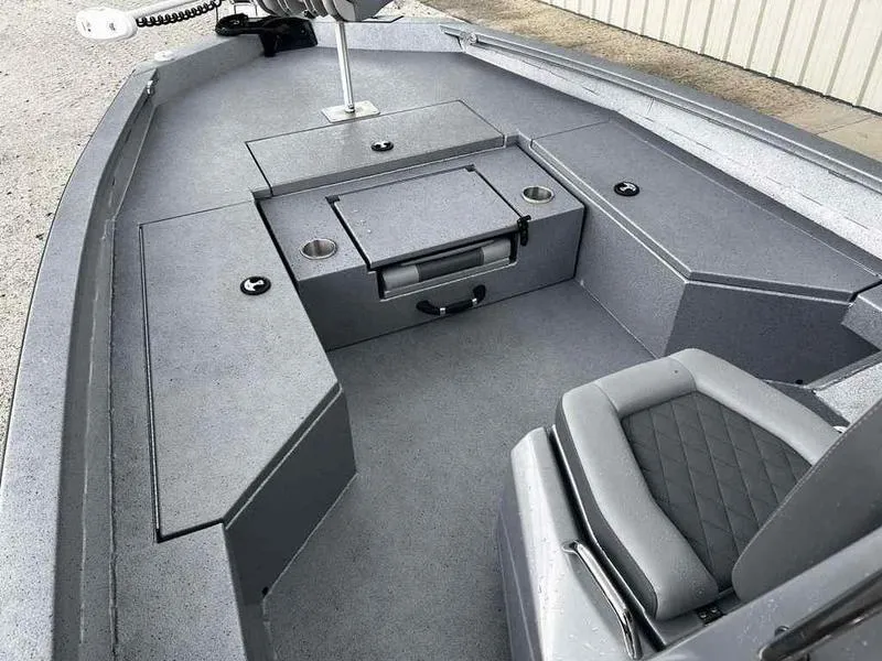 Slide: The Image of 2025 Xpress H22 Bay boat interior with storage compartments and seating. - 1