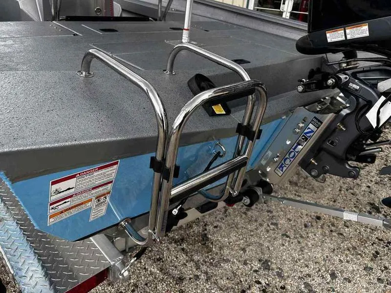 Slide: The Image of 2025 Xpress H22 Bay boat with stainless steel ladder and motor mount. - 15
