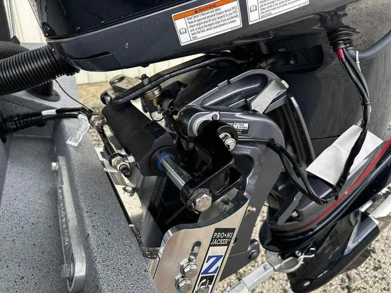 Slide: The Image of 2025 Xpress H22 Bay boat engine detail with Pro-Hi Jacker system. - 17