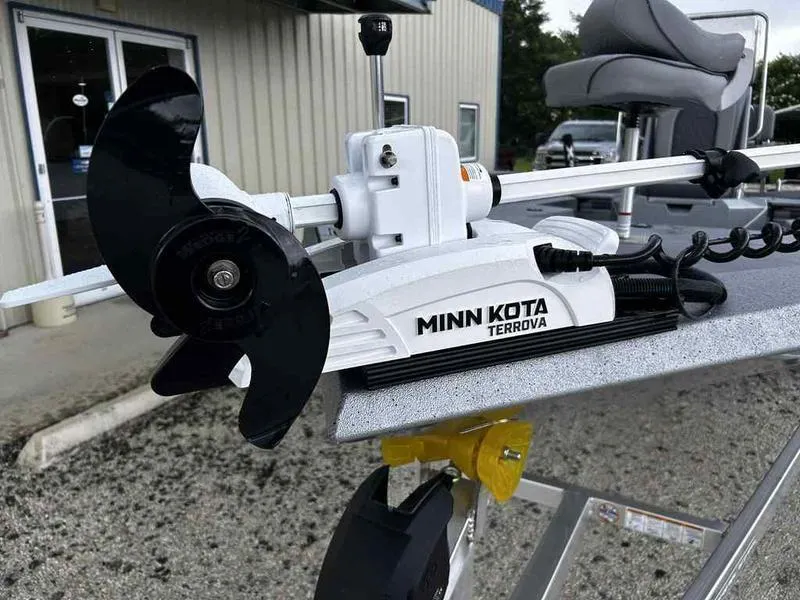 Slide: The Image of Minn Kota Terrova motor on 2025 Xpress H22 Bay boat, outdoor setting. - 8