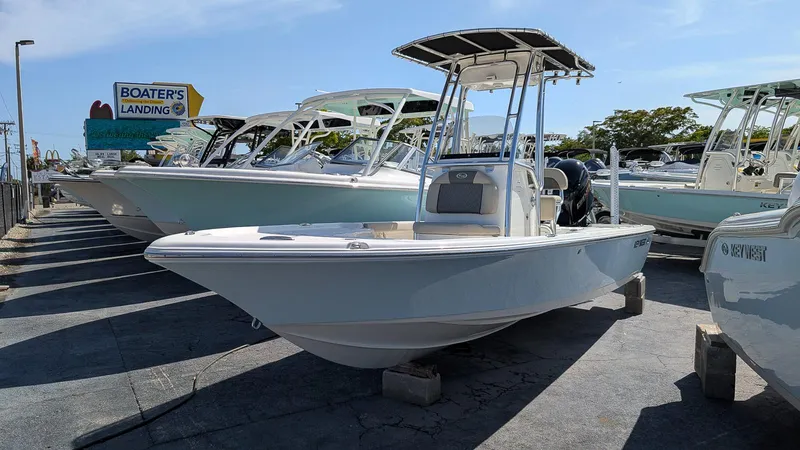 Slide: The Image of 2025 Key West 210 Bay Reef boat displayed at Boater's Landing dealership. - 0
