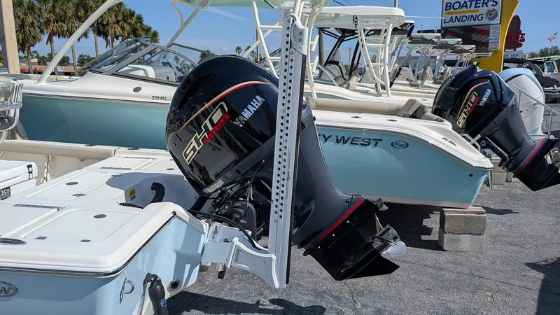 Slide: The Image of 2025 Key West 210 Bay Reef boat with Yamaha outboard motor at marina. - 3
