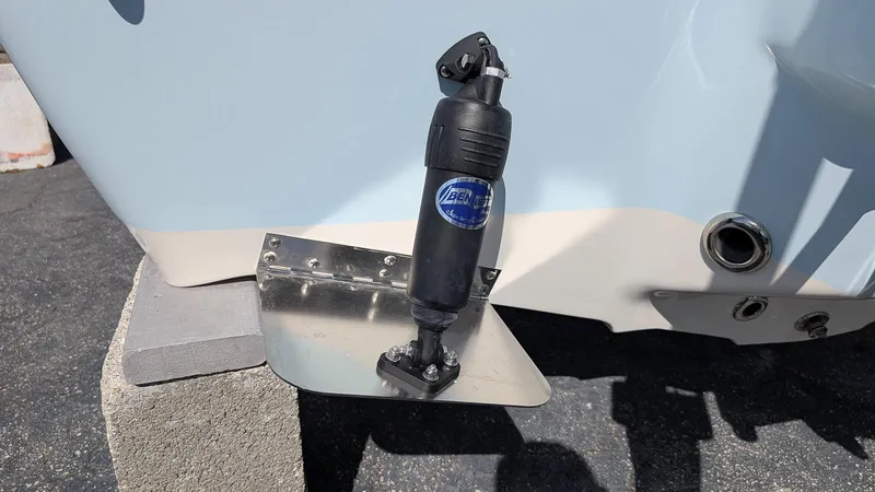 Slide: The Image of Key West 210 Bay Reef 2025 boat trim tab detail in sunlight. - 4