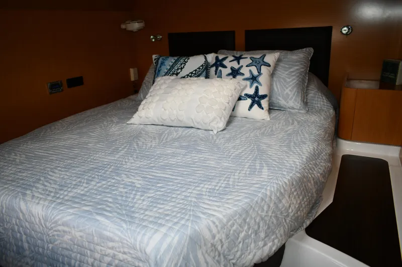 Slide: The Image of Cozy bedroom in 2012 Fountaine Pajot 40 yacht with starfish-themed pillows. - 14
