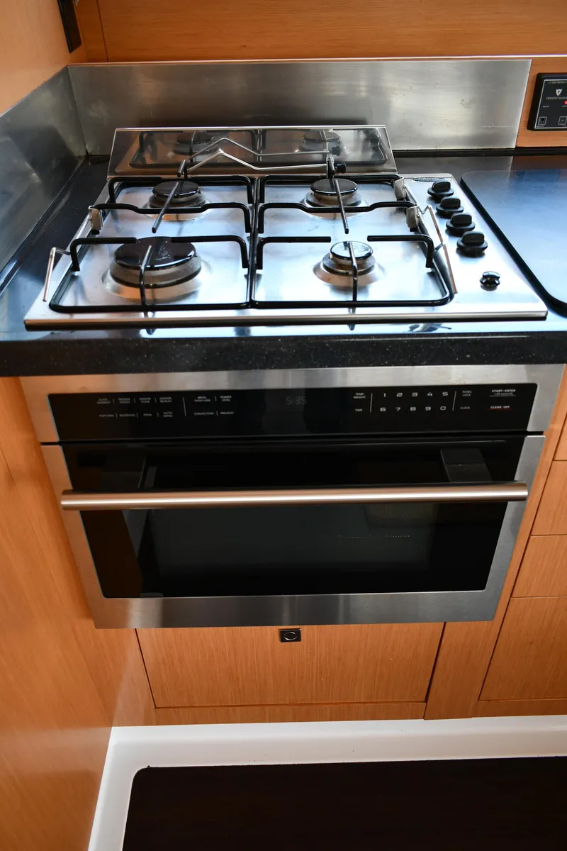 Slide: The Image of Modern kitchen stove and oven in 2012 Fountaine Pajot 40 yacht galley. - 20