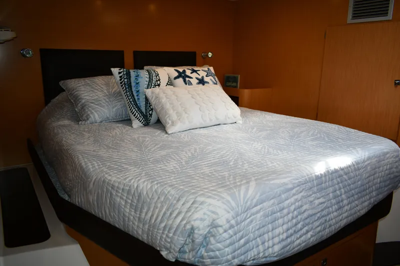 Slide: The Image of Luxurious bedroom interior of 2012 Fountaine Pajot 40 yacht with cozy bedding. - 27