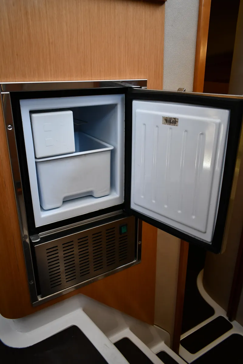 Slide: The Image of Small freezer inside 2012 Fountaine Pajot 40 yacht, open door, compact design. - 30