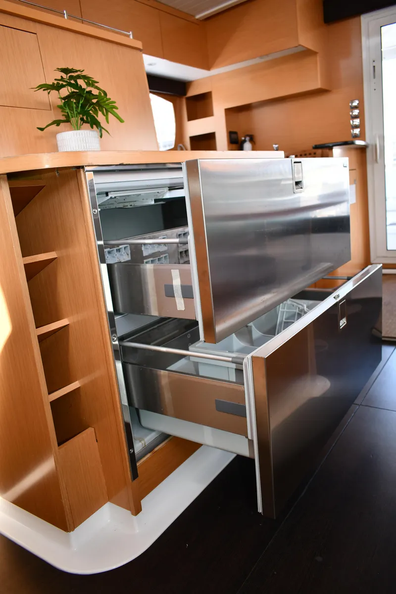Slide: The Image of Modern kitchen with open stainless steel drawers on a 2012 Fountaine Pajot 40 yacht. - 32