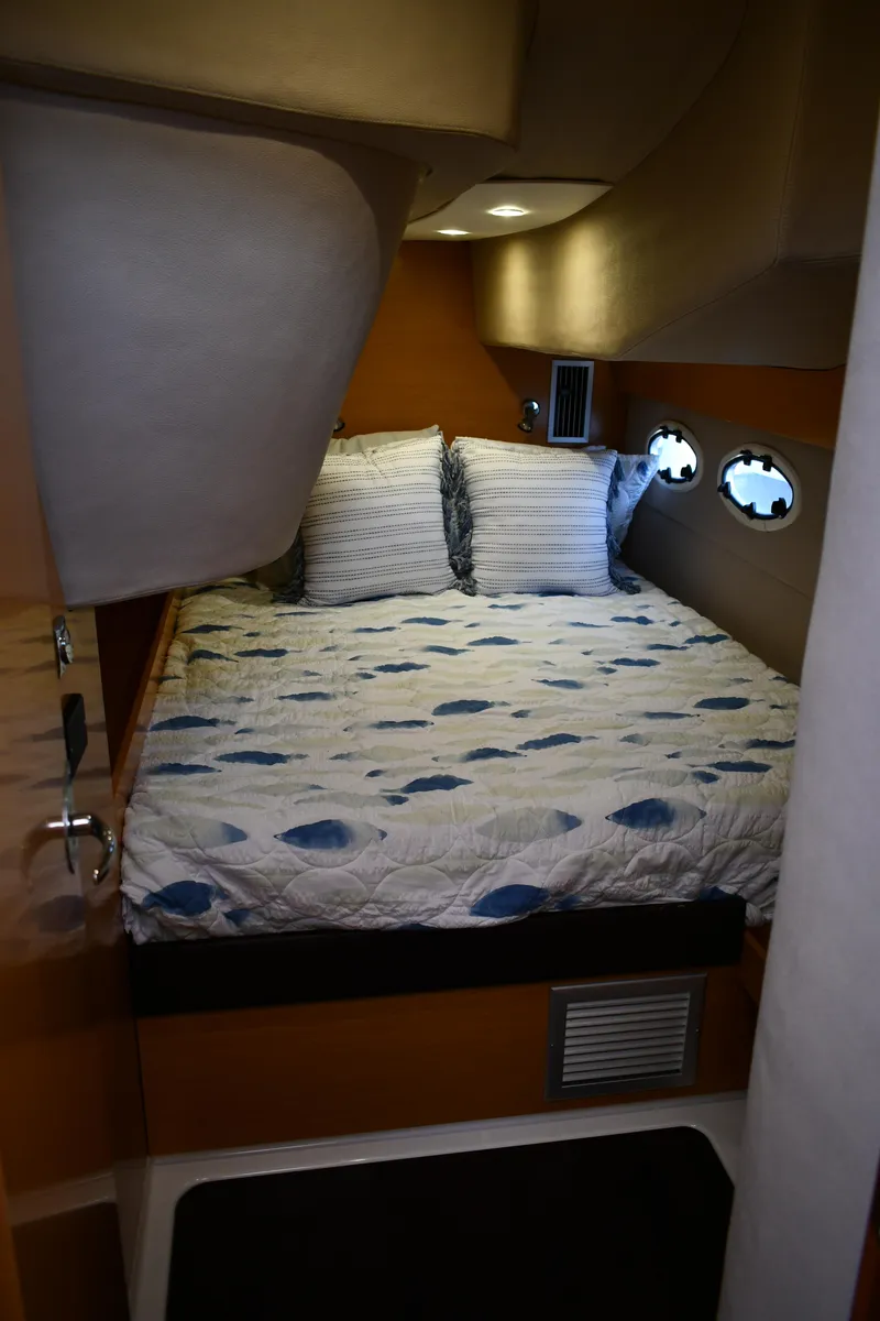 Slide: The Image of Cabin interior of 2012 Fountaine Pajot 40 catamaran with cozy bed and porthole windows. - 38
