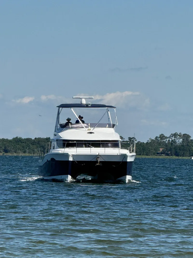 Slide: The Image of 2012 Fountaine Pajot 40 catamaran cruising on a sunny day. - 4