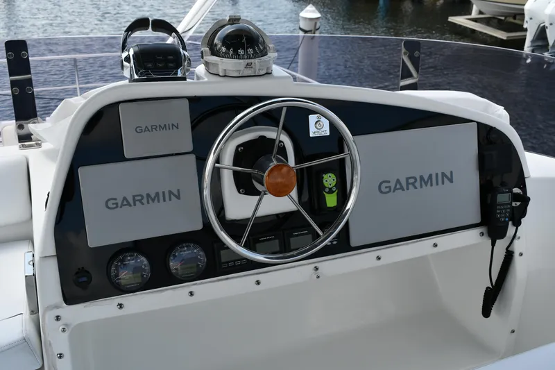 Slide: The Image of Helm of 2012 Fountaine Pajot 40 catamaran with Garmin navigation systems and steering wheel. - 42