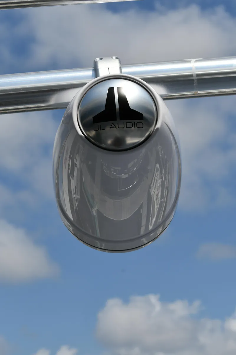 Slide: The Image of JL Audio speaker on Fountaine Pajot 40 catamaran, 2012, against a blue sky. - 46