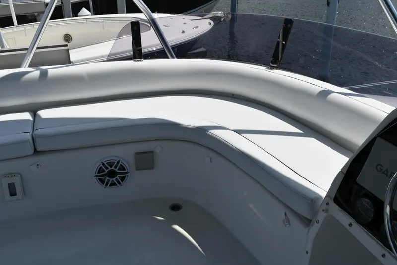Slide: The Image of Interior seating area of a 2012 Fountaine Pajot 40 catamaran, featuring white cushioned seats. - 48