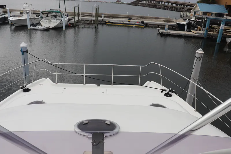 Slide: The Image of Front deck view of 2012 Fountaine Pajot 40 catamaran docked at marina. - 7