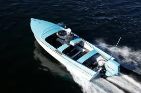 Slide: The Image of Aerial view of 2025 Starcraft 57 SKI CHAMP boat cruising on water. - 8