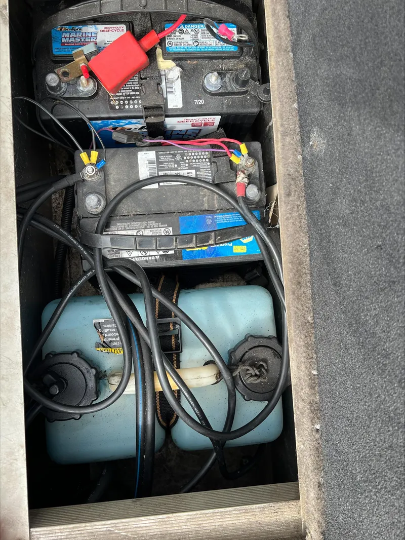 Slide: The Image of Batteries and fuel tank in 1998 Tracker Targa 185 WT boat compartment. - 10