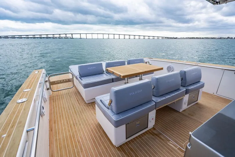 Slide: The Image of 2022 Pardo Yachts 43 with elegant deck seating and ocean view. - 10