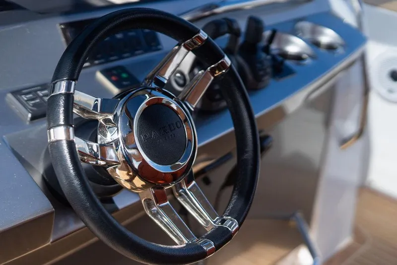 Slide: The Image of Steering wheel of 2022 Pardo Yachts 43, showcasing sleek design and modern controls. - 16