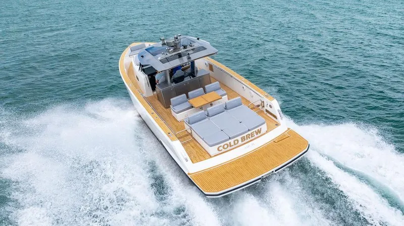 Slide: The Image of 2022 Pardo Yachts 43 cruising on open water, featuring sleek design and spacious deck. - 17