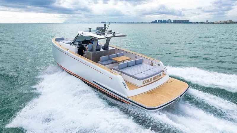 Slide: The Image of 2022 Pardo Yachts 43 cruising on open water, showcasing sleek design and spacious deck. - 25
