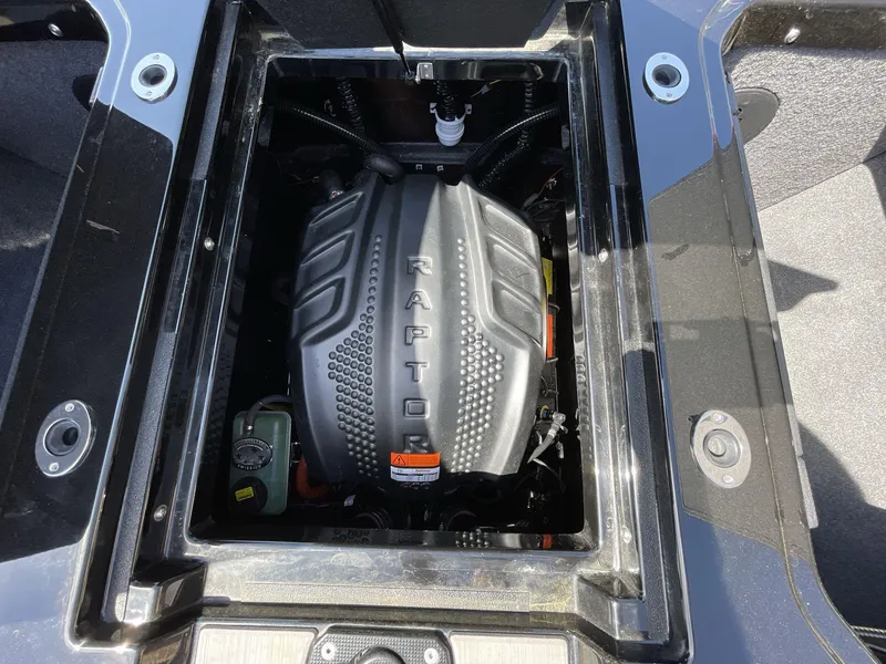Slide: The Image of 2023 Moomba Craz boat engine compartment featuring a Raptor engine. - 19