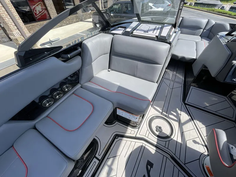 Slide: The Image of 2023 Moomba Craz boat interior with gray seating and modern design. - 29