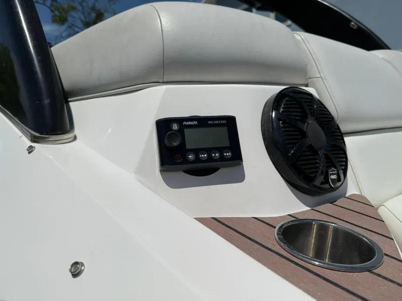 Slide: The Image of 2011 Regal 2500 Bowrider interior with audio controls and speaker. - 38