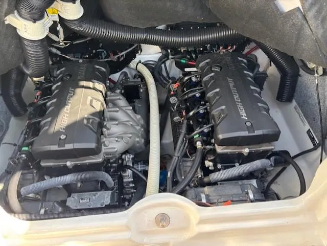 Slide: The Image of 2016 Yamaha Boats 242 Limited S engine compartment with dual high-output engines. - 17