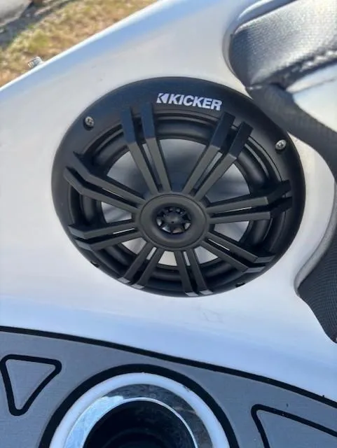 Slide: The Image of Kicker speaker on 2016 Yamaha Boats 242 Limited S dashboard. - 6