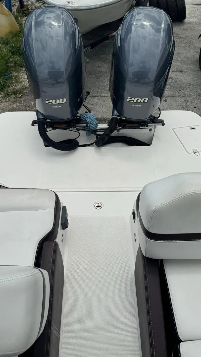 Slide: The Image of 2017 Regal 29 OBX boat with twin 200 horsepower outboard engines. - 13