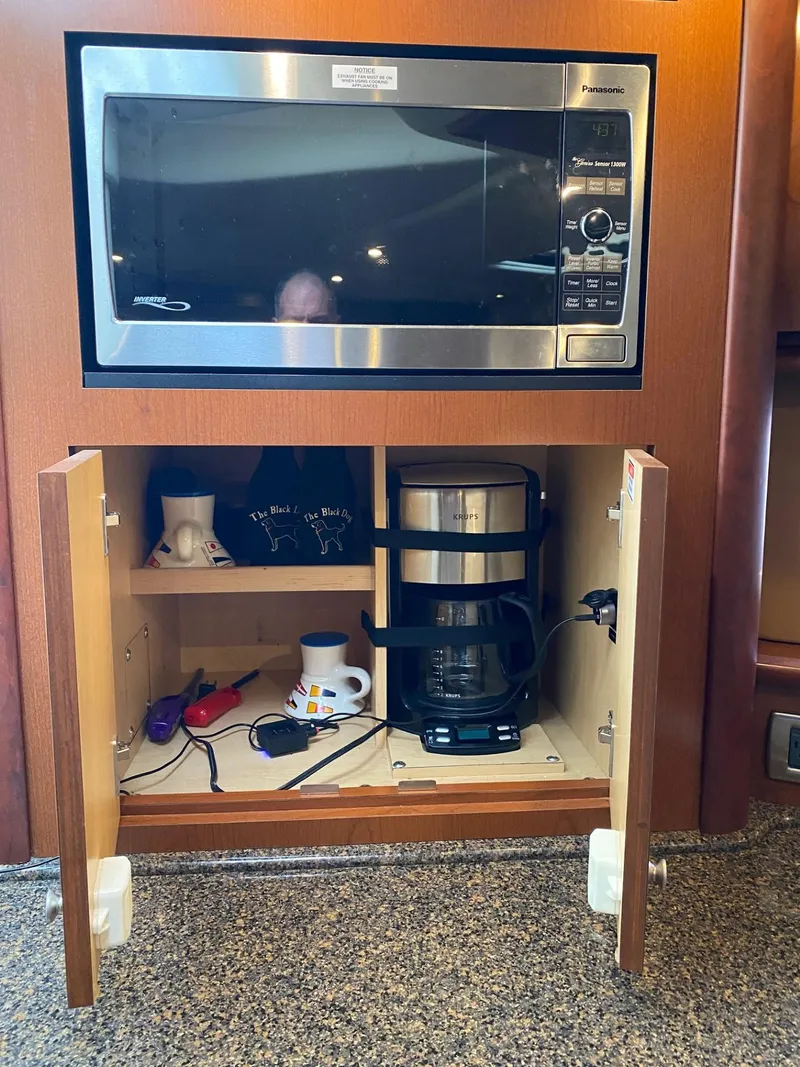 Slide: The Image of Microwave and coffee maker in 2007 Sea Ray 40 Sundancer yacht kitchen. - 11