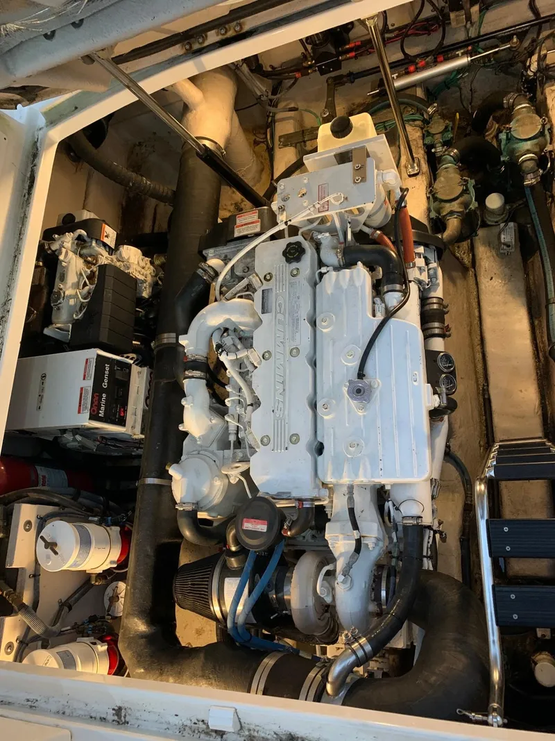 Slide: The Image of Engine compartment of a 2007 Sea Ray 40 Sundancer boat, showcasing mechanical components. - 17