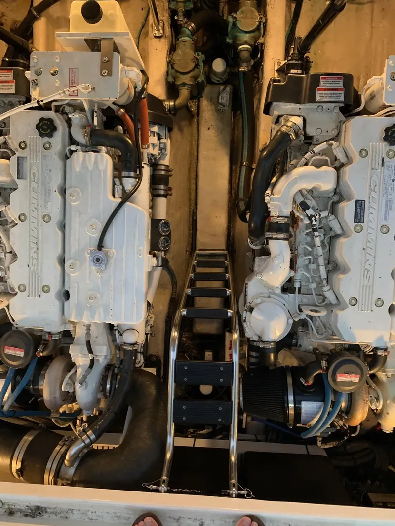 Slide: The Image of Engine room of a 2007 Sea Ray 40 Sundancer with twin engines. - 18