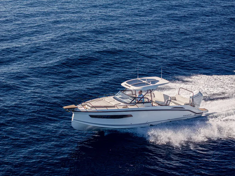 Slide: The Image of Navan S30 2025 boat cruising on open sea, showcasing sleek design and performance. - 3