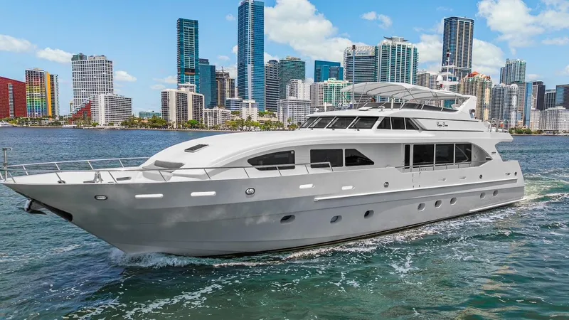 The Image of Luxury Intermarine RPH 95 yacht cruising near city skyline, 2001 model. - 0