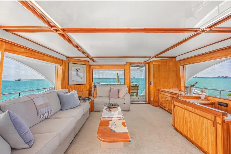 Slide: The Image of Luxurious 2001 Intermarine RPH 95 yacht interior with elegant wood finishes and ocean views. - 22