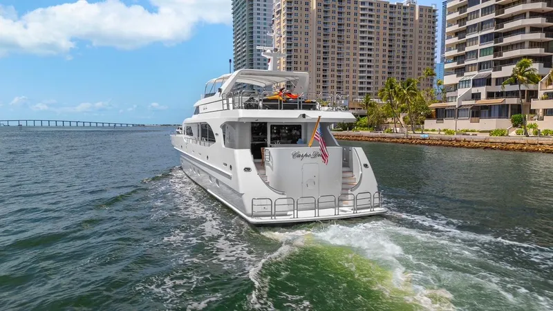 Slide: The Image of Luxury yacht Intermarine RPH 95 cruising near city waterfront, 2001 model. - 3