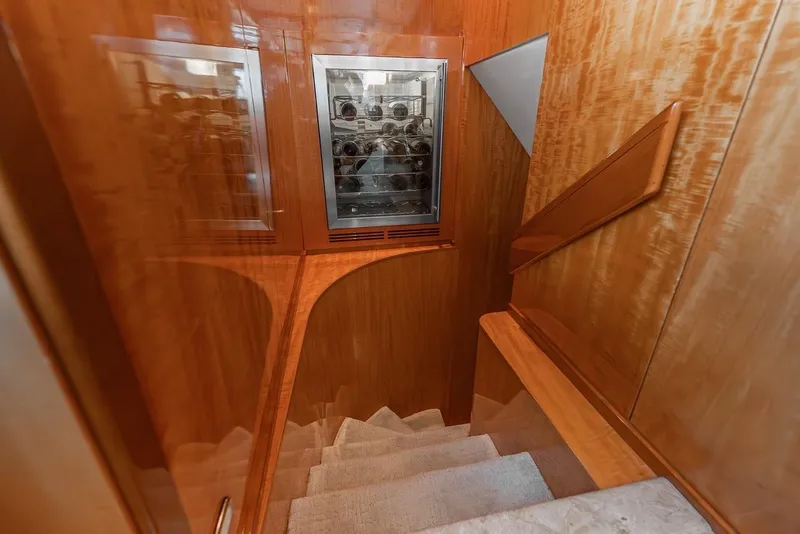 Slide: The Image of Staircase with wooden paneling and wine storage on Intermarine RPH 95 yacht, 2001 model. - 31