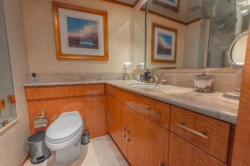 Slide: The Image of Luxurious bathroom on 2001 Intermarine RPH 95 yacht with wood cabinetry and modern fixtures. - 35