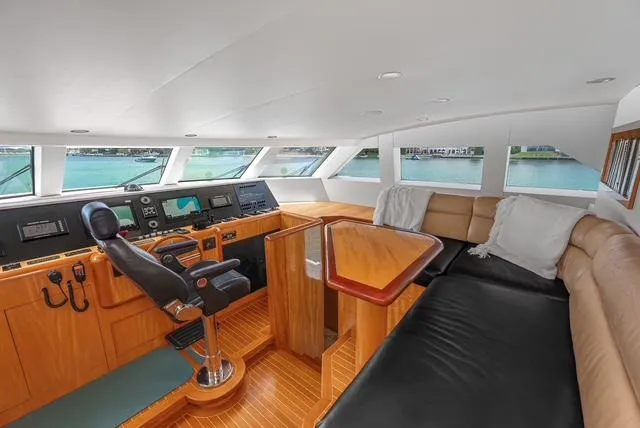 Slide: The Image of Luxurious 2001 Intermarine RPH 95 yacht interior with helm, seating, and panoramic windows. - 36