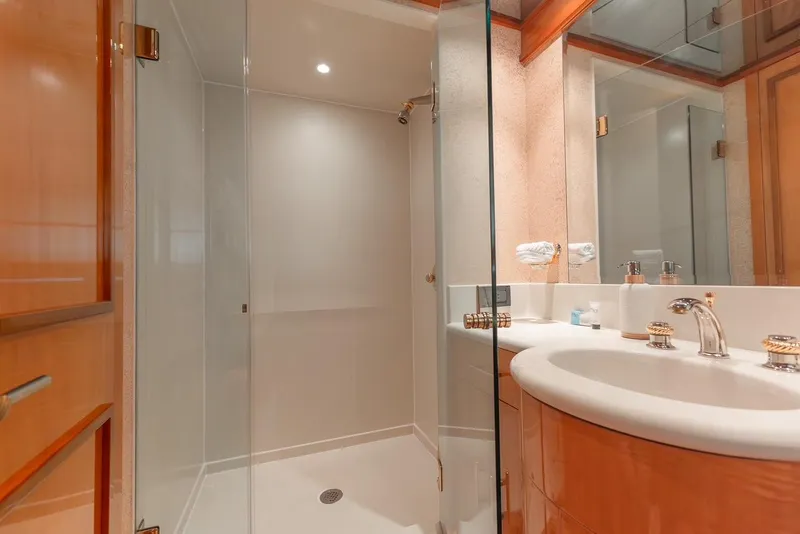 Slide: The Image of Luxurious bathroom in 2001 Intermarine RPH 95 yacht with glass shower and elegant fixtures. - 39