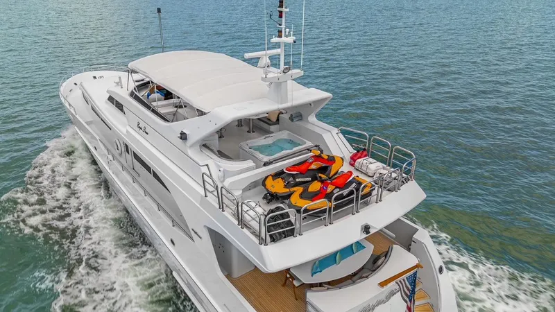 Slide: The Image of Luxury yacht Intermarine RPH 95, 2001 model, cruising with jet skis on deck. - 5