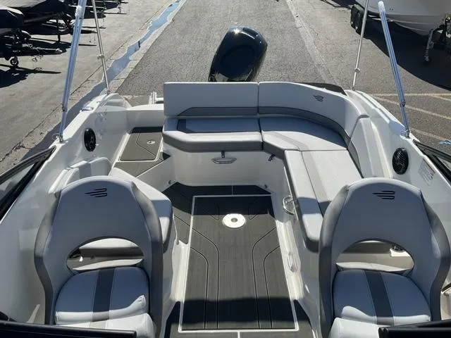 Slide: The Image of 2025 Bayliner V20 boat interior with modern seating and sleek design. - 14