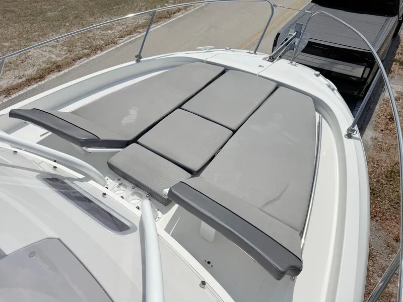 Slide: The Image of 2018 Jeanneau Leader 9.0 WA boat with spacious sunbathing deck and sleek design. - 10