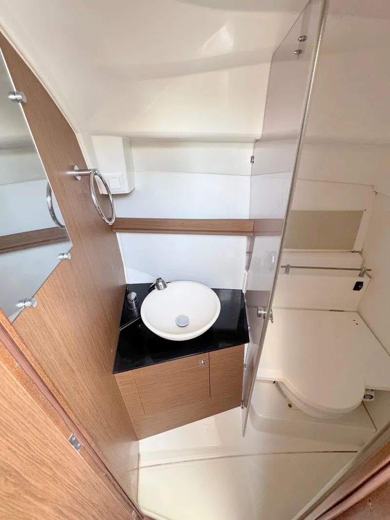 Slide: The Image of 2018 Jeanneau Leader 9.0 WA bathroom with sink and toilet. - 16